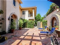 GORGEOUS GATED TUSCAN-STYLE VILLA IN THE BURBANK HILLS