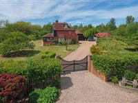 A RURAL RETREAT BEAUTIFULLY SITED IN AN OASIS OF WILDERNESS IN THE HAM FEN NATURE RESERVE