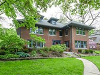 ELEGANT, LIGHT-FILLED BRICK HOME