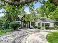 ENCHANTING ESTATE NESTLED ON LUSH AND SCENIC GROUNDS