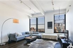 AMAZING DUMBO CONDOMINIUM WITH VIEWS OF THE SKYLINE AND STATUE OF LIBERTY