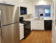 BEAUTIFULLY UPDATED, ONE LEVEL UNIT