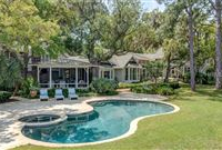 TIMELESS ELEGANCE ATOP A PREMIER WATERFRONT LOT